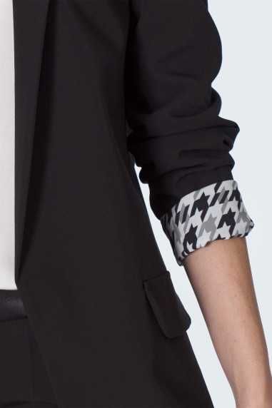 Veste noire à manches retroussées à motif pépito - nife  