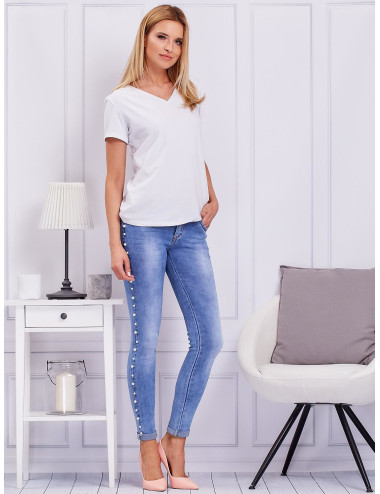 Blue jeans trousers with pearls  