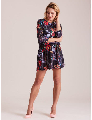 Black dress with colorful floral pattern 