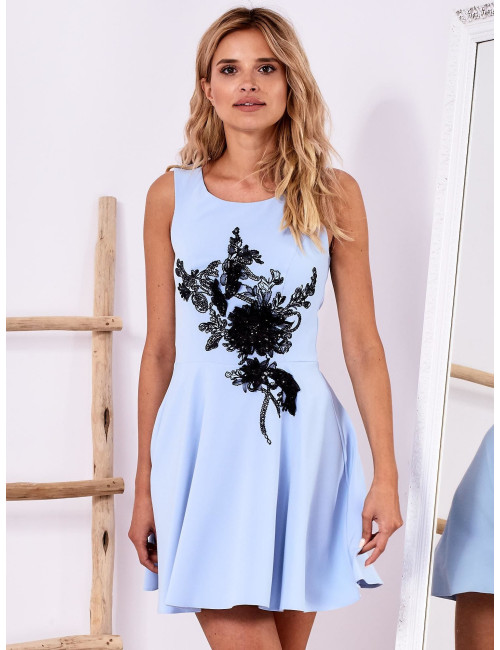 Blue dress with vegetable appliqué 