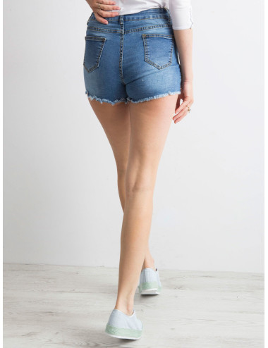 Blue denim shorts with pearls and rips 