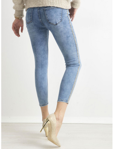 Niebieskie jeansy ankle skinny z cekinowym lampasem 