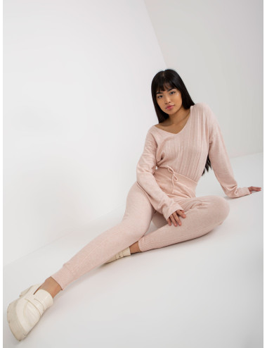 Light pink women's knitted trousers with rib  