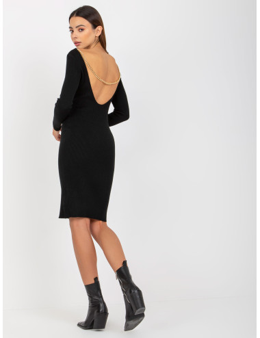 Black knitted dress with a neckline on the back 