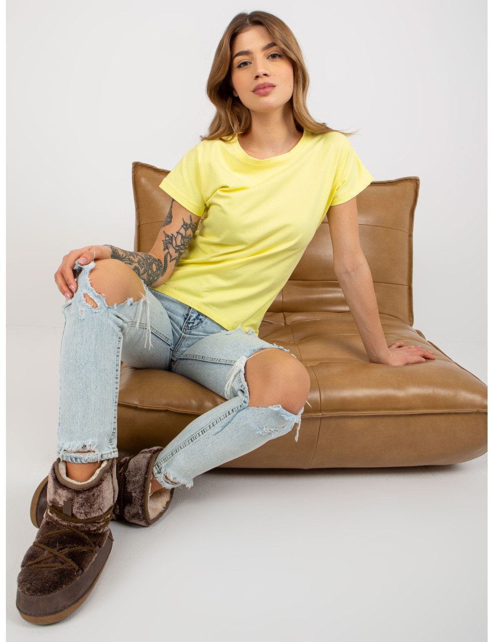 Light yellow solid color basic t-shirt with round neckline  