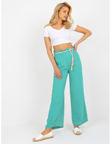 Turquoise fabric swedes pants with braided belt  