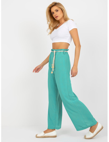 Turquoise fabric swedes pants with braided belt  