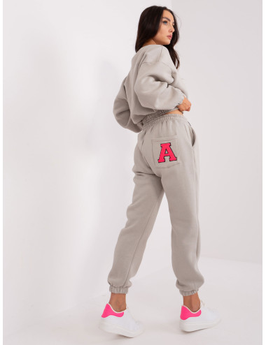 Grey and pink women's tracksuit set with patches 