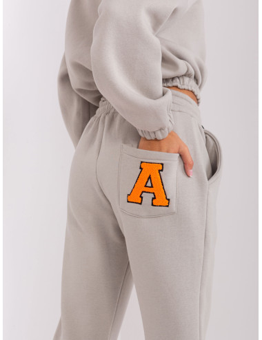 Grey-fluo orange two-piece tracksuit set 