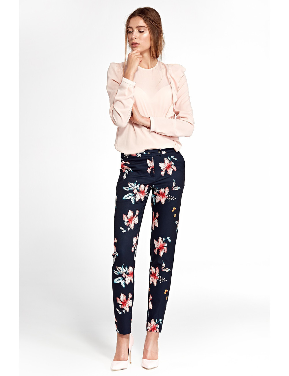 Pantalon fleuri élégant avec jambes légèrement fuselées 